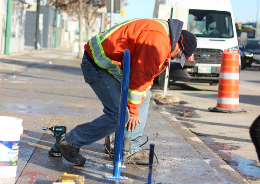 West End BIZ Installs 150th Bike Rack in the West End